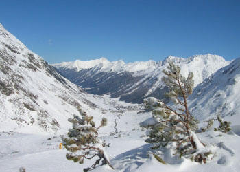 winter skiurlaub hotel an der skipiste landschaft